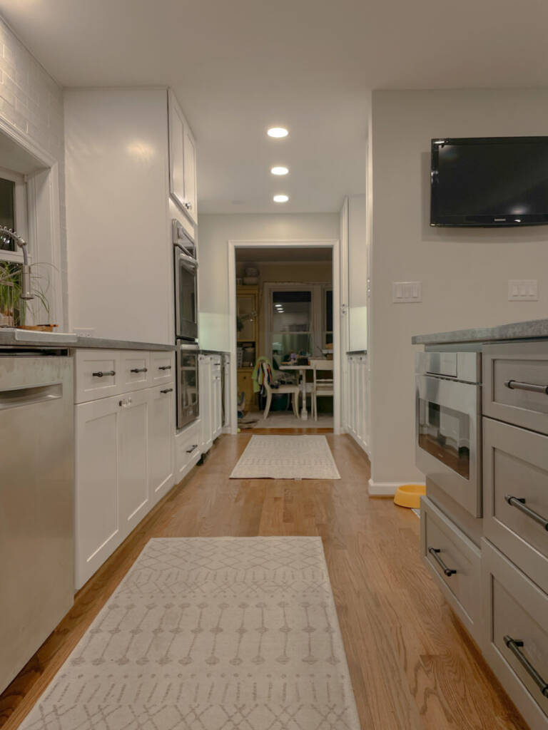 Hale Navy Hood, Custom Wood hood, Recessed Lighting, Leathered countertops, spacious kitchen, two tone cabinets, under counter lighting, full wall subway tiles, bay window, built-in appliances, built in range, interior remodel, interior design, open concept flow, level 5 drywall finishing, big island, quartz counters, soapstone countertops, high end remodeling,